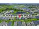 This aerial view shows the location of the home in relation to nearby ponds and surrounding neighborhoods at 5415 Limelight Dr, Apollo Beach, FL 33572