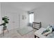 Bright bedroom features a large closet, charming decor, and ample natural light from the window at 5415 Limelight Dr, Apollo Beach, FL 33572