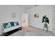 Inviting bedroom with couch, beach decor and ample natural light at 5415 Limelight Dr, Apollo Beach, FL 33572