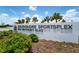 Sign for Southshore Sportsplex at Waterset Blvd, set amidst green foliage and palm trees under a sunny sky at 5415 Limelight Dr, Apollo Beach, FL 33572