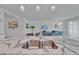 Bright kitchen features granite countertops, stainless steel sink, and an open view to the living area at 5415 Limelight Dr, Apollo Beach, FL 33572