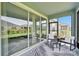 View of screened-in lanai with sliding doors leading to the outside at 5415 Limelight Dr, Apollo Beach, FL 33572