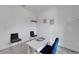 Bright office featuring a neutral desk, chairs, decor and carpet flooring at 5415 Limelight Dr, Apollo Beach, FL 33572