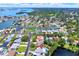 Beautiful aerial view of a waterfront community with lush greenery and canal access at 5473 Bayshore Dr, Seminole, FL 33772