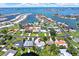 Stunning aerial view showcasing waterfront homes and access to the Gulf of Mexico at 5473 Bayshore Dr, Seminole, FL 33772
