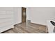 Bright bedroom featuring modern floors and a sleek desk at 5473 Bayshore Dr, Seminole, FL 33772