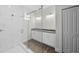 Modern bathroom featuring a glass-enclosed shower and double vanity at 5707 N 20Th St, Tampa, FL 33610