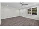A bright bedroom features recessed lighting, sleek flooring and a large window at 5707 N 20Th St, Tampa, FL 33610