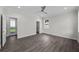 Well-lit bedroom with a ceiling fan and window providing natural light and outside view at 5707 N 20Th St, Tampa, FL 33610