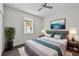 Comfortable bedroom features hard wood flooring, stylish decor, and a plush rug at 5707 N 20Th St, Tampa, FL 33610