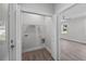 A laundry room features hookups and shelving at 5707 N 20Th St, Tampa, FL 33610