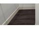Close up of the dark wood style flooring at 5709 N 20Th St, Tampa, FL 33610