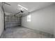 Spacious garage with concrete floor and door at 5709 N 20Th St, Tampa, FL 33610