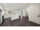 Bright, open kitchen with a large island, stainless appliances, and a seamless transition to the living area at 5709 N 20Th St, Tampa, FL 33610