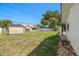Expansive backyard with mature trees offering shade and a peaceful setting at 6236 17Th S St, St Petersburg, FL 33712