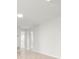 Bright hallway with tile floors leading to various rooms within the home at 6236 17Th S St, St Petersburg, FL 33712