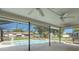 Relaxing screened-in pool area with ceiling fans and outdoor seating space at 6236 17Th S St, St Petersburg, FL 33712