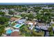 Birds eye view of a charming property with a well-manicured lawn and inviting pool area at 6554 34Th N Ave, St Petersburg, FL 33710
