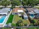 A lovely backyard featuring a manicured lawn and white privacy fence at 6554 34Th N Ave, St Petersburg, FL 33710