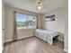Bright bedroom with hardwood floors and a sunny window at 6554 34Th N Ave, St Petersburg, FL 33710