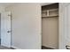 Walk-in closet with open shelving and clothes rod at 6554 34Th N Ave, St Petersburg, FL 33710