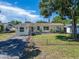 Well-kept single-Gathering home with a lovely yard, offering a welcoming atmosphere at 6554 34Th N Ave, St Petersburg, FL 33710