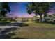 Charming single-story home with a well-maintained front yard and mature trees in a quiet neighborhood at 6554 34Th N Ave, St Petersburg, FL 33710