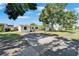 Charming single story home with a spacious front yard and a paved driveway at 6554 34Th N Ave, St Petersburg, FL 33710