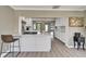 Updated open-concept kitchen featuring marble countertops, stainless steel appliances, and abundant cabinet space at 6554 34Th N Ave, St Petersburg, FL 33710