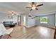 Spacious living room showcases contemporary decor, smooth floors, and an inviting seating area with natural light at 6554 34Th N Ave, St Petersburg, FL 33710