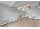 Well-lit living room showcasing sleek floors, recessed lighting, and modern, comfortable seating near airy windows at 6554 34Th N Ave, St Petersburg, FL 33710