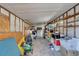 Inside the shed, ample space for storage and organization with shelving installed at 6554 34Th N Ave, St Petersburg, FL 33710
