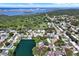 Scenic aerial view of a residential area close to the water, with lush green spaces at 6561 Exeter Ct, Seminole, FL 33772