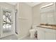 Bathroom with a glass shower door at 6561 Exeter Ct, Seminole, FL 33772