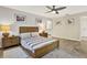Cozy bedroom with tile floors, natural light, and neutral décor at 6561 Exeter Ct, Seminole, FL 33772