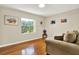Hardwood flooring and natural light create a bright, inviting atmosphere at 6561 Exeter Ct, Seminole, FL 33772