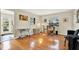 Hardwood flooring and natural light make this living room comfortable at 6561 Exeter Ct, Seminole, FL 33772