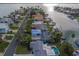 Aerial view of a waterfront neighborhood with boat docks and easy access to the open water at 735 123Rd Ave, Treasure Island, FL 33706