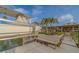View of boat on lift, showing direct water access and the backyard of the waterfront property at 735 123Rd Ave, Treasure Island, FL 33706