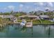 Waterfront home with private boat dock, offering direct access to the water and stunning views at 735 123Rd Ave, Treasure Island, FL 33706