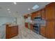Updated kitchen featuring granite counters, stainless steel appliances, and ample cabinet space at 735 123Rd Ave, Treasure Island, FL 33706