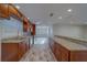 Updated kitchen with stainless steel appliances, wood cabinets, and granite countertops at 735 123Rd Ave, Treasure Island, FL 33706