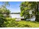 Wooden dock on the lake surrounded by trees and greenery. Beware of Alligators! at 7821 Niagara Ave # 2102, Tampa, FL 33617