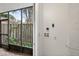 Enclosed lanai area with tiled flooring and convenient laundry hookups at 7821 Niagara Ave # 2102, Tampa, FL 33617