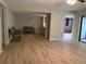 Living room showing open floor plan into dining room and kitchen at 7821 Niagara Ave # 2102, Tampa, FL 33617