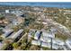 Breathtaking aerial view of coastal townhouses near the bay, blending residential charm with natural beauty at 803 Oak Bend Ln, Dunedin, FL 34698