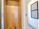 Home elevator with light wood paneling, providing easy access between floors and adding accessibility to the home at 803 Oak Bend Ln, Dunedin, FL 34698