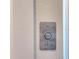 Call button for the home elevator, offering accessibility and convenience for residents and visitors at 803 Oak Bend Ln, Dunedin, FL 34698