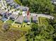 Aerial view of a home with spacious backyard, in a neighborhood bordering conservation area at 8423 Praise Dr, Tampa, FL 33625