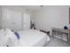 Neutral bedroom with carpeted floors, light gray walls, and contemporary furniture perfect for relaxation at 8423 Praise Dr, Tampa, FL 33625